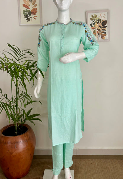 Springtime Chic: The Pastel Green Kurta Set with Playful Embroideries