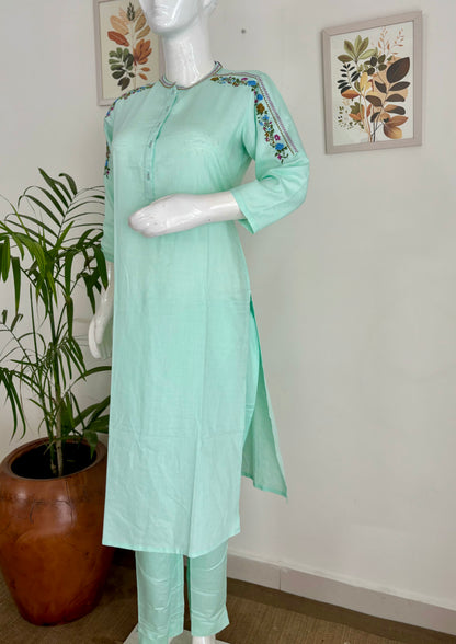 Springtime Chic: The Pastel Green Kurta Set with Playful Embroideries