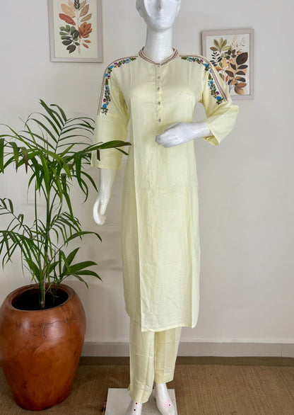 Sunshine Muse: The Pastel Yellow Kurta Set with Rainbow Brilliance