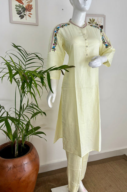 Sunshine Muse: The Pastel Yellow Kurta Set with Rainbow Brilliance