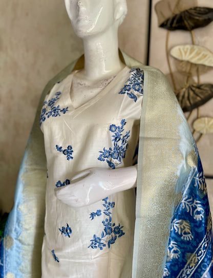 White A-Line Silk Kurta Set with Blue Floral Embroidery & Zari Dupatta