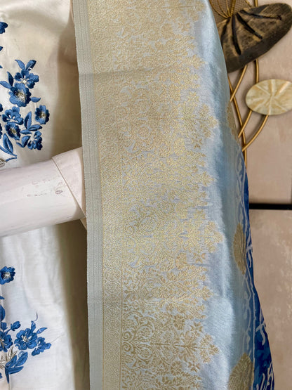 White A-Line Silk Kurta Set with Blue Floral Embroidery & Zari Dupatta